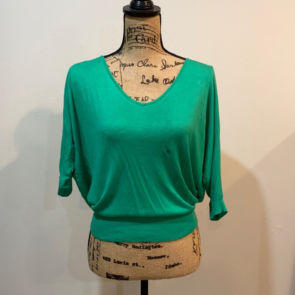 Express top with adorable cut out back!